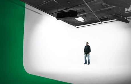 Person standing in empty video production studio